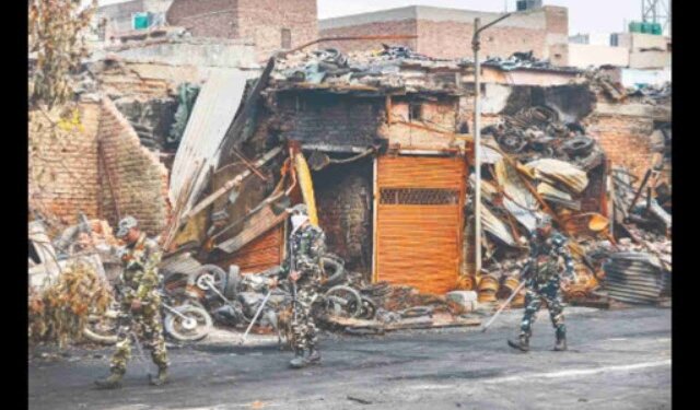 Delhi violence: People picking up the pieces amid tight security