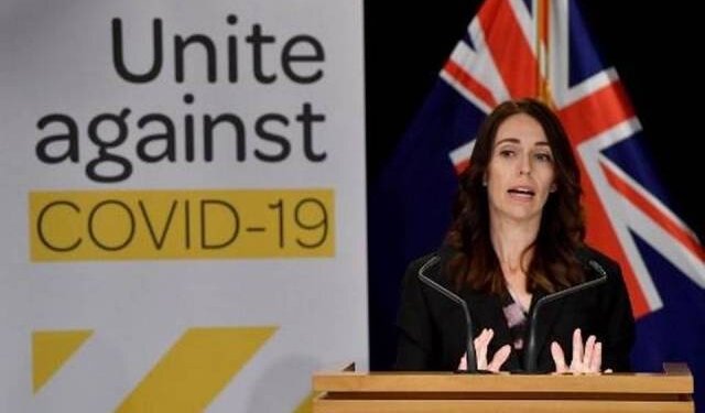 New Zealand PM takes pay cut as virus hits economy