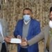 COVID-19 Pandemic ED Bank presents one day salary of Rs 4.73 lacs cheque to Div Com for LG Cares Fund Div Com lauds humanitarian gesture of bank staff