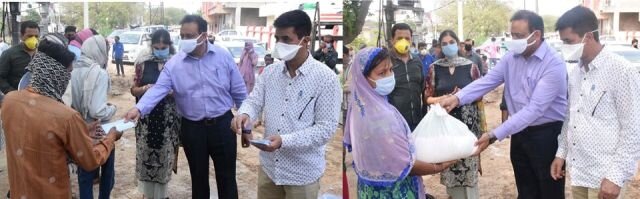 COVID-19 Saurabh Bhagat distributes masks, edibles among ISM workers