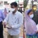 COVID-19 Saurabh Bhagat distributes masks, edibles among ISM workers