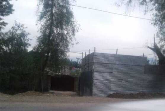 Illegal tin sheds coming up on Srinagar-Baramulla highway near Pattan