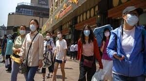 Beijing city says face masks not required outdoors