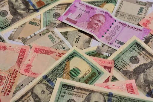 Rupee surges 7 paise to 74.26 against US dollar in early trade