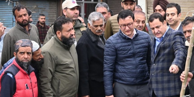 Javed Dar visits fire affected families in old town Baramulla, assures timely relief, rehabilitation