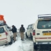 Anantnag Police Rescue Stranded Passenger Vehicle at Sinthan Top