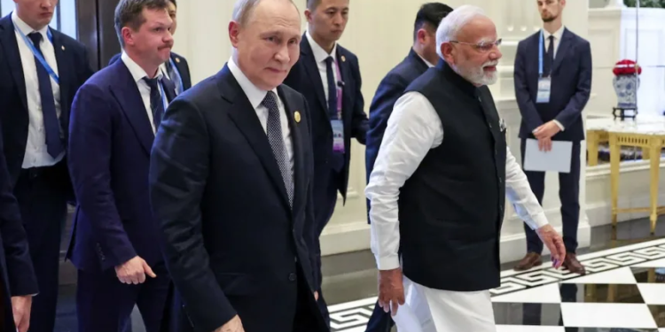 PM Modi receives Russian President Vladimir Putin as he arrives in Delhi for state visit