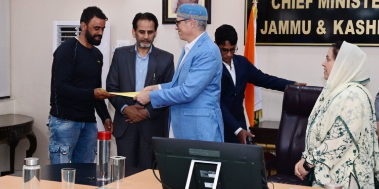 CM Omar Hands Over Regularisation Orders to CPWs