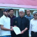 J-K LG hands over appointment letter to son of police constable killed in Anantnag